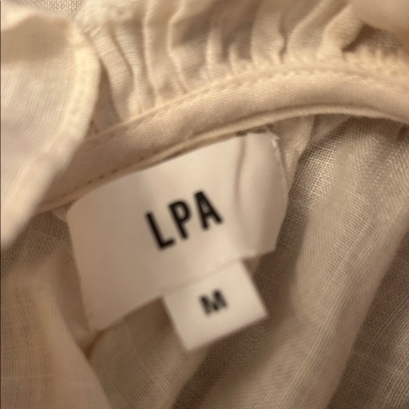 Cute cream ruffle dress! - Picture 4 of 4